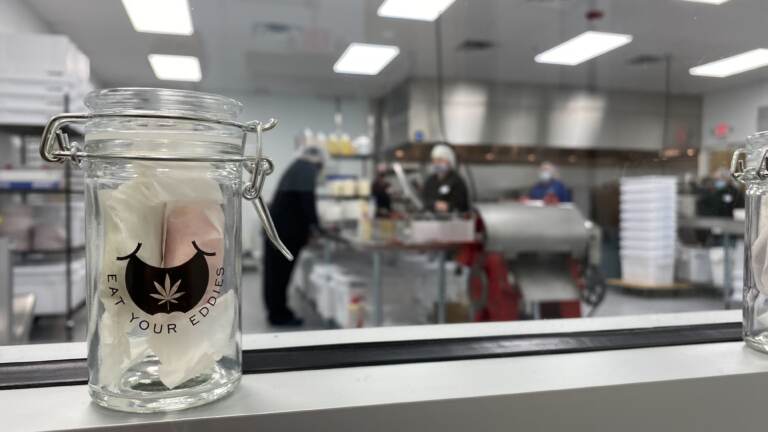 Signage for Betty's Eddies is seen looking into a 'marijuana kitchen'