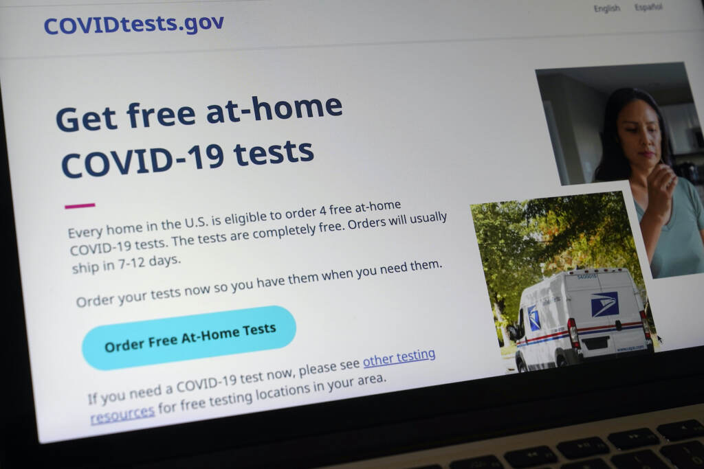 Virus Outbreak A federal website is displayed on a computer that features a page where people can order free, at-home COVID-19 tests