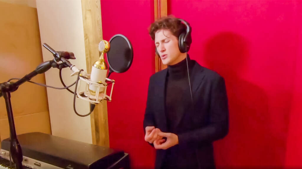 curtis-1611 Colin Aikins singing in a studio