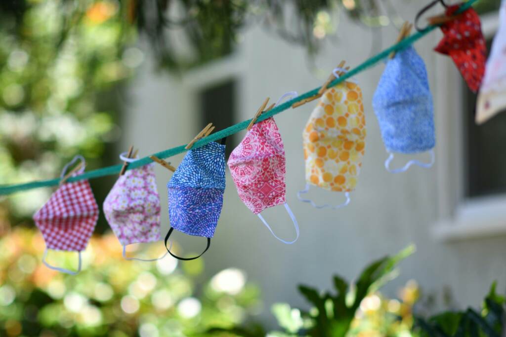 For sale masks are seen displayed on a clothesline in the front yard of a house in Los Angeles on July 20, 2020. TOPSHOT - For sale masks are seen displayed on a clothesline in the front yard of a house in Los Angeles on July 20, 2020. - The number of COVID-19 hospitalizations in Los Angeles County were at their highest level at the weekend since the pandemic began, as 15 children were diagnosed with a rare and potentially deadly virus-related inflammatory syndrome.