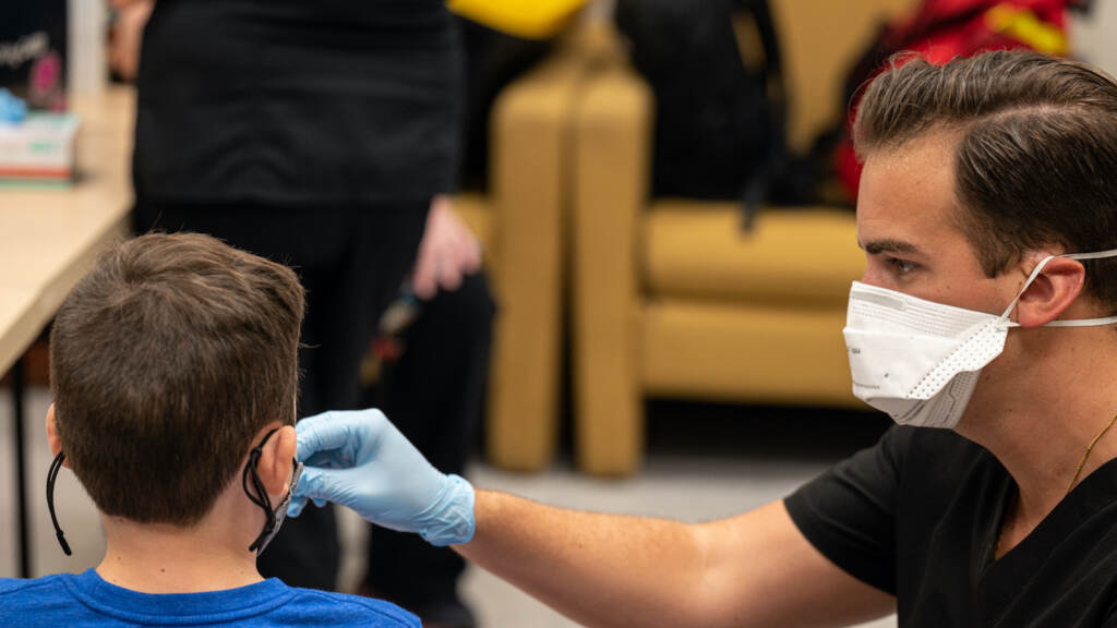 Elementary School Kids In Louisville, Kentucky Get Tested For Covid-19, As The County Prepares For In Person Learning A student is administered a COVID-19 test