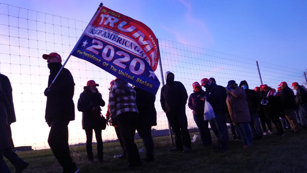 Supporters of then-President Donald Trump arrive for a campaign rally on Nov. 2, 2020, in Kenosha, Wis. Supporters of President Donald Trump arrive for a campaign rally at the Kenosha Regional Airport on November 02, 2020 in Kenosha, Wisconsin. (Photo by Scott Olson/Getty Images)