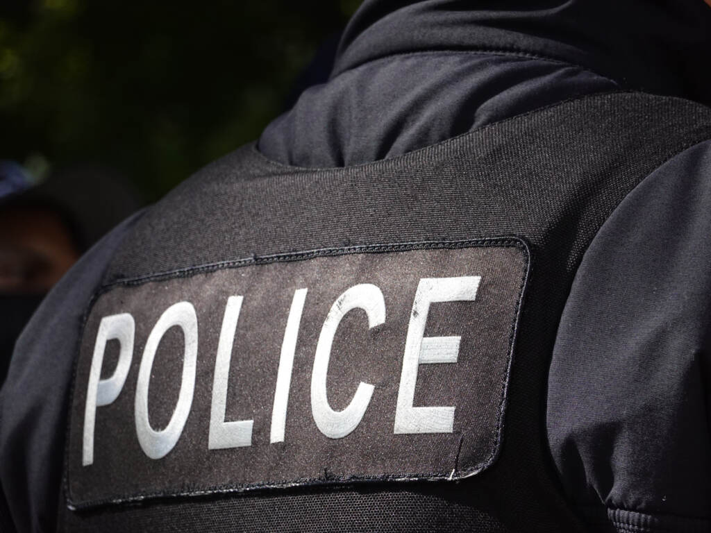 A Chicago police officer’s uniform pictured in October 2021 in Chicago, Illinois. A new preliminary report says 458 U.S. law enforcement officers died in 2021, citing COVID-19 as the leading cause of death for the second consecutive year. A Chicago police officer's uniform pictured in October 2021 in Chicago, Illinois. A new preliminary report says 458 U.S. law enforcement officers died in 2021, citing COVID-19 as the leading cause of death for the second consecutive year. (Scott Olson/Getty Images)