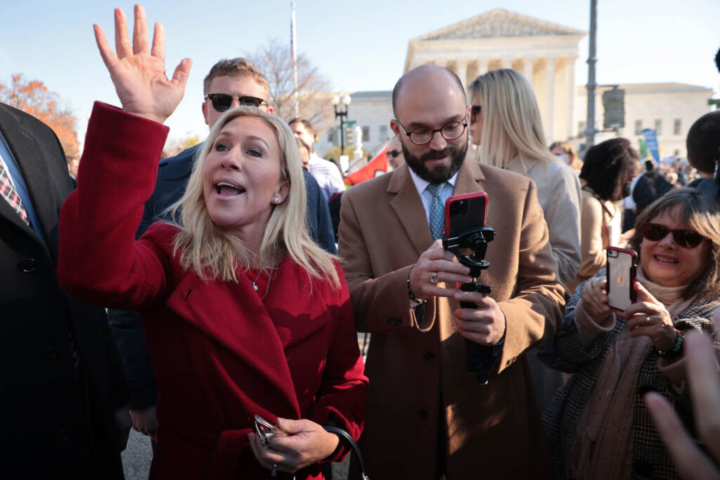 Rep. Marjorie Taylor Greene, R-Ga., joins fellow anti-abortion activists in front of the U.S. Supreme Court as the justices hear hear arguments in Dobbs v. Jackson Women’s Health, a case about a Mississippi law that bans most abortions after 15 weeks, on Dec. 1, 2021 in Washington, D.C. WASHINGTON, DC - DECEMBER 01: Rep. Marjorie Taylor Greene (R-GA) joins fellow anti-abortion activists in front of the U.S. Supreme Court as the justices hear hear arguments in Dobbs v. Jackson Women's Health, a case about a Mississippi law that bans most abortions after 15 weeks, on December 01, 2021 in Washington, DC. With the addition of conservative justices to the court by former President Donald Trump, experts believe this could be the most important abortion case in decades and could undermine or overturn Roe v. Wade. (Photo by Chip Somodevilla/Getty Images)