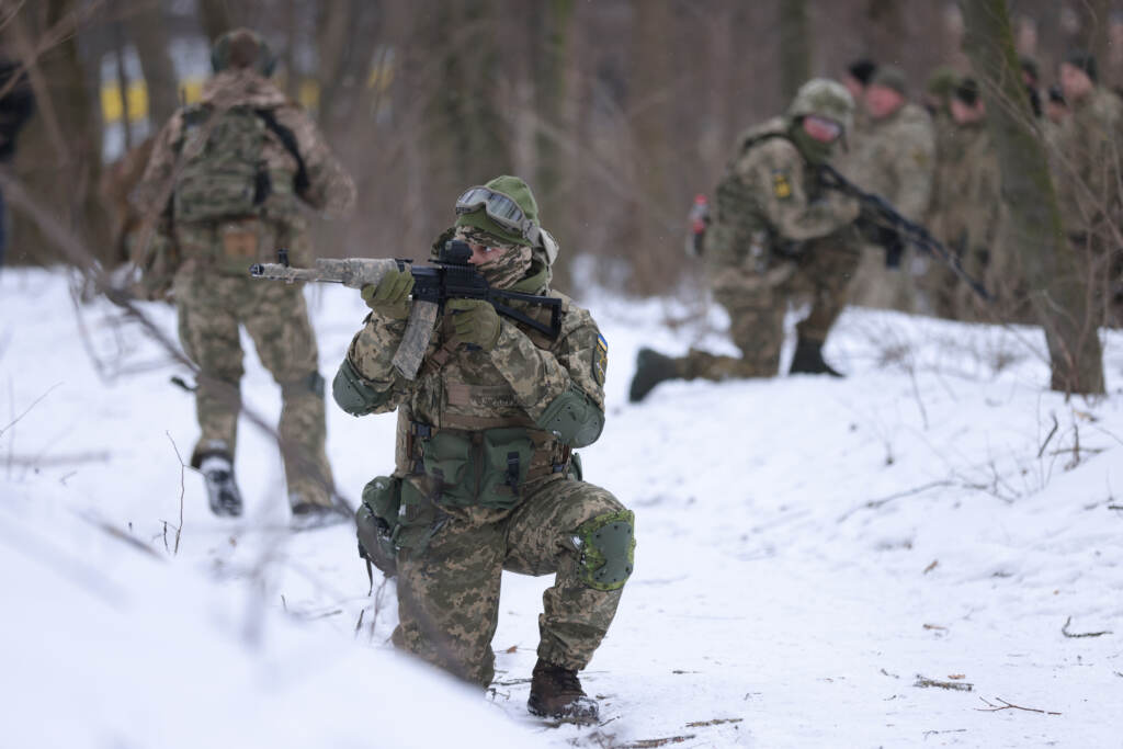 Civilian participants in a Kyiv Territorial Defense unit train on a Saturday in a forest on Jan. 22, 2022 in Kyiv, Ukraine. Across Ukraine thousands of civilians are participating in such groups to receive basic combat training and in time of war would be under direct command of the Ukrainian military. KYIV, UKRAINE - JANUARY 22: Civilian participants in a Kyiv Territorial Defence unit train on a Saturday in a forest on January 22, 2022 in Kyiv, Ukraine. Across Ukraine thousands of civilians are participating in such groups to receive basic combat training and in time of war would be under direct command of the Ukrainian military. While Ukrainian officials have acknowledged the country has little chance to fend off a full Russian invasion, Russian occupation troops would likely face a deep-rooted, decentralised and prolonged insurgency. Russia has amassed tens of thousands of troops on its border to Ukraine. (Photo by Sean Gallup/Getty Images)