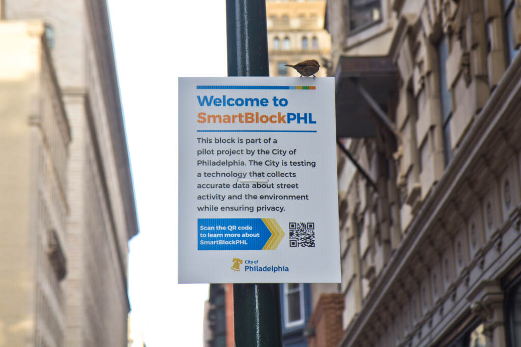 Signs about the project adorn lampposts on the 100 block of South 13th Street.