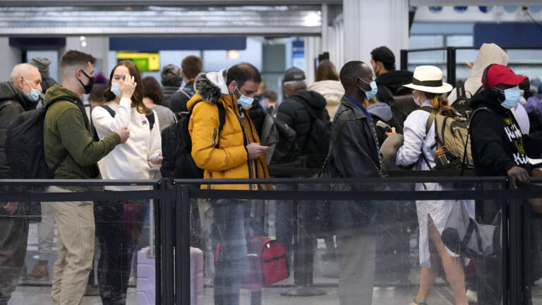 Travelers line up at O'Hare International Airport