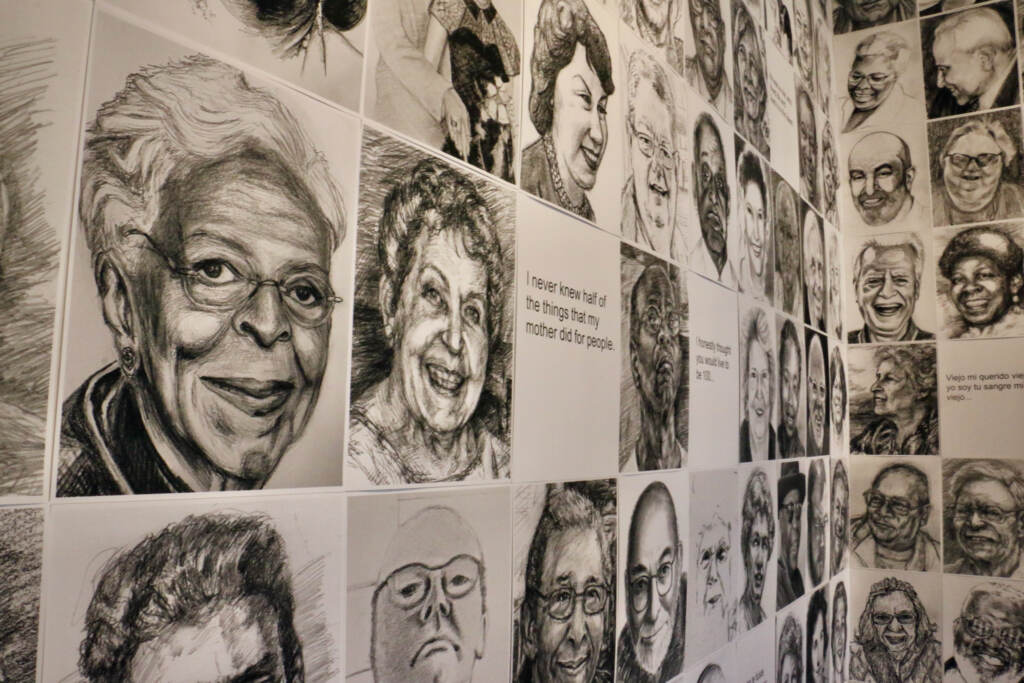 2022 02 08-e lee-philadelphia inliquid gallery-covid 19 portrait project wall The COVID-19 Portrait Project seeks to document those who died of COVID-19. Artist RA Friedman began with Philadelphians then expanded the project to include other artists and all U.S. residents. A selection of drawings is on display at InLiquid gallery in Kensington