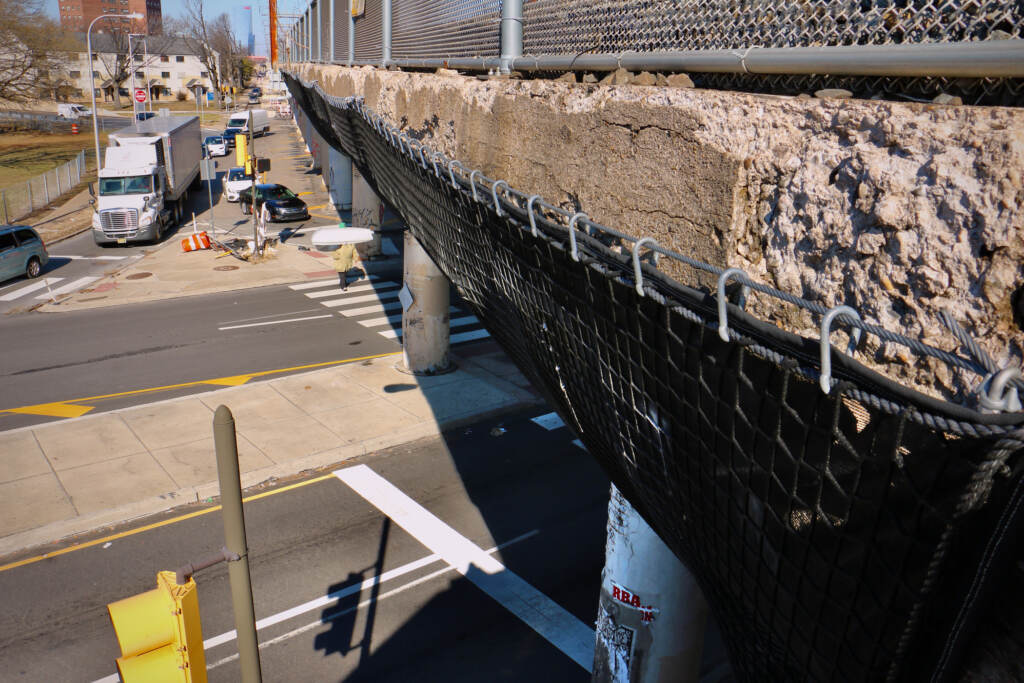 Safety netting prevents concrete from falling onto the streets