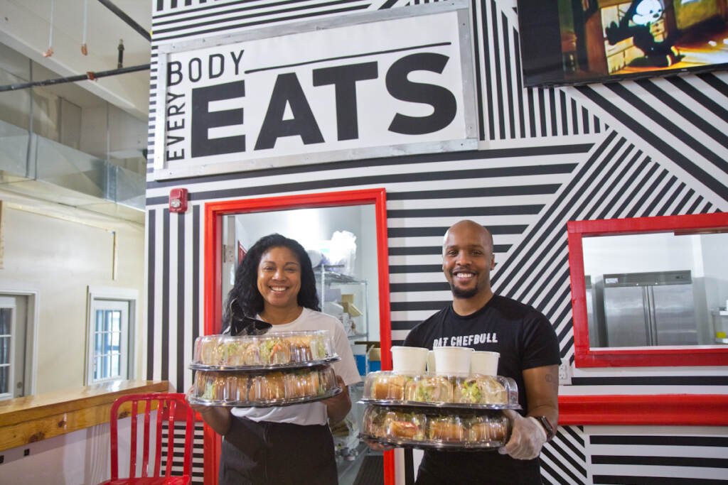2022 02 18 kpaynter everybody eats chester Stephanie Willis (left) and Malik Ali hold hoagies inside Vittles food hall
