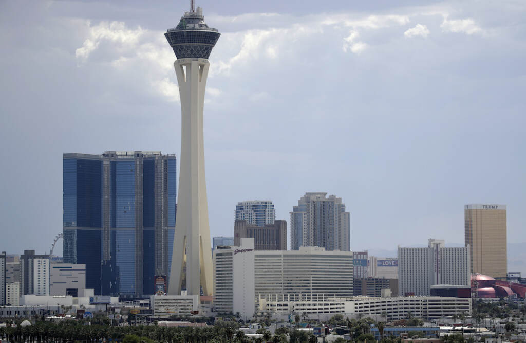 NCAA Bids-Las Vegas Basketball File photo: This Tuesday, Aug. 29, 2017, file photo shows the Las Vegas skyline. (AP Photo/John Locher, File)
