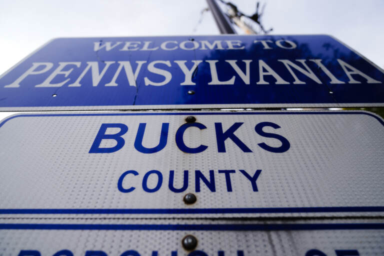 A sign is posted in New Hope, Pa., upon entering Bucks County from New Jersey, Thursday, Nov. 4, 2021. (AP Photo/Matt Rourke)