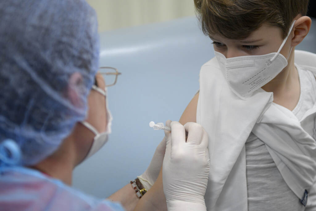 Virus Outbreak Romania Children Vaccination Alexis gets a COVID-19 vaccine