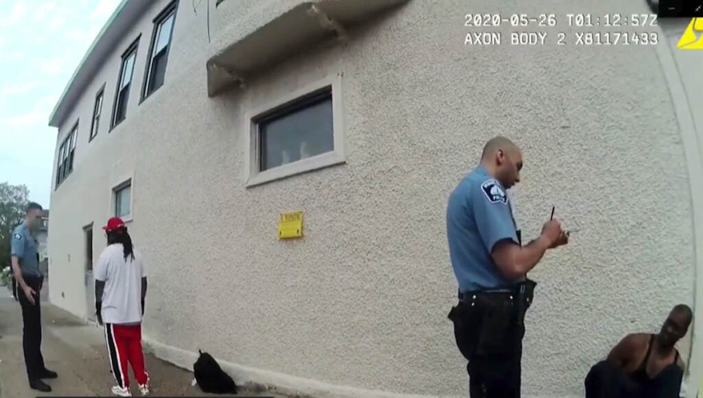 George Floyd Officers Civil Rights FILE - In this image from police body camera video shown as evidence in court, Minneapolis police Officers Thomas Lane, left, and J. Alexander Kueng, second from right, gather information as they take George Floyd into custody outside Cup Foods in Minneapolis, on May 25, 2020. Former police Officers Tou Thao, Kueng and Lane are on trial in federal court accused of violating Floyd's civil rights as fellow Officer Derek Chauvin killed him. (Minneapolis Police Department via AP, File)