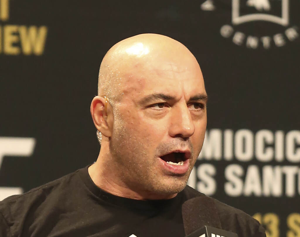 Joe Rogan File photo: Joe Rogan is seen during a weigh-in before UFC 211 on Friday, May 12, 2017, in Dallas before UFC 211. Spotify’s popular U.S. podcaster has apologized after a video compilation surfaced that showed him using racial slurs in clips of episodes over a 12-year span. In a video posted on his Instagram account on Saturday, Feb. 5, 2022, Rogan who hosts a podcast called “The Joe Rogan Experience,” said his use of the slurs was the ''most regretful and shameful thing that I’ve ever had to talk about publicly.'' ( AP Photo/Gregory Payan, File)