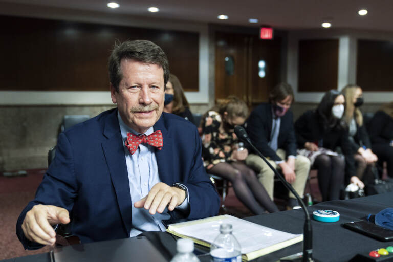File photo: Dr. Robert Califf gathers his documents as the Senate Committee on Health, Education, Labor and Pension adjourn a hearing on the nomination of Califf to be Commissioner of Food and Drug Administration on Capitol Hill in Washington, on Dec. 14, 2021. (AP Photo/Manuel Balce Ceneta, File)