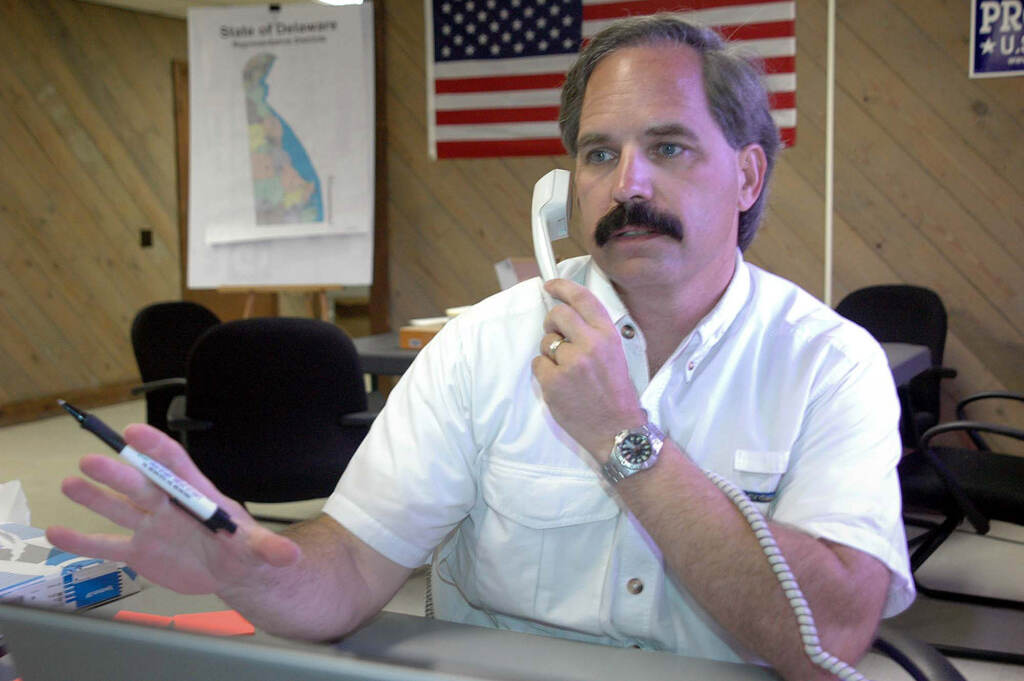 Former Candidate-Threats Then-Delaware Republican Senatorial candidate Mike Protack takes a call at his office in Wilmington, Del., on Aug. 14, 2006. The former Delaware political candidate who unsuccessfully sought the Republican nominations for governor and U.S. Senate has been sentenced to a year in prison after pleading guilty to federal charges of mailing threats to a lawyer who represented his wife in a divorce case. Protack was sentenced Tuesday, Feb. 8, 2022 after pleading guilty in August to two counts of mailing a threatening communication. (AP Photo/Pat Crowe II, file)