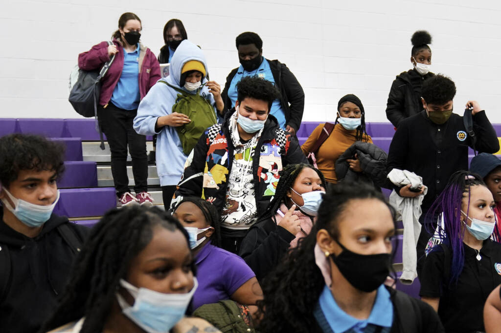 Virus Outbreak New Jersey Students wearing masks