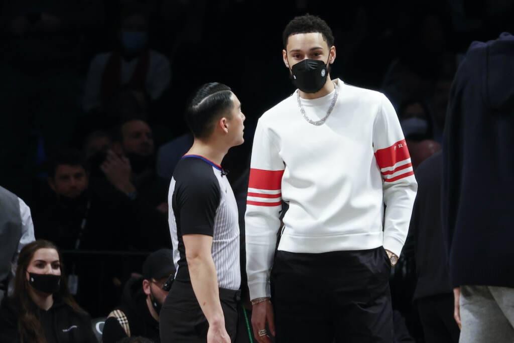 Kings Nets Basketball Brooklyn Nets' Ben Simmons, right, looks on during the second half of an NBA basketball game against the Sacramento Kings, Monday, Feb. 14, 2022, in New York. (AP Photo/Corey Sipkin)