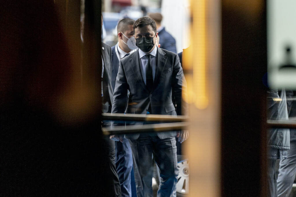 APTOPIX Germany Munich Security Conference Harris Ukrainian President Volodymyr Zelenskyy walks into the Bayerischer Hof Hotel after meeting with Vice President Kamala Harris during the Munich Security Conference, Saturday, Feb. 19, 2022, in Munich. (AP Photo/Andrew Harnik, Pool)
