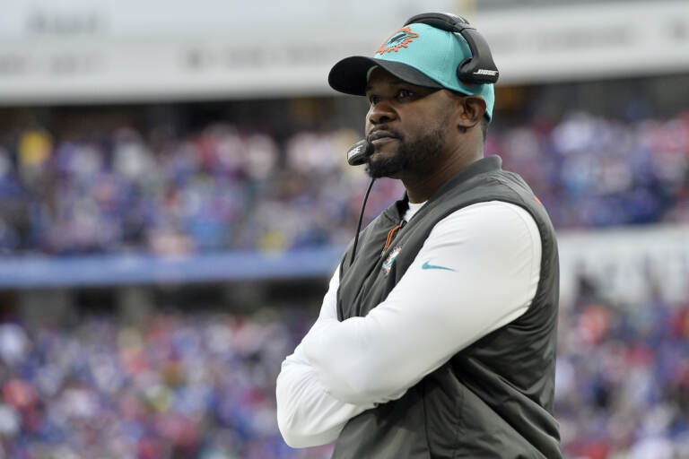 Miami Dolphins head coach Brian Flores watches from the sideline during the first half of an NFL football game against the Buffalo Bills, Sunday, Oct. 31, 2021, in Orchard Park, N.Y. (AP Photo/Adrian Kraus)