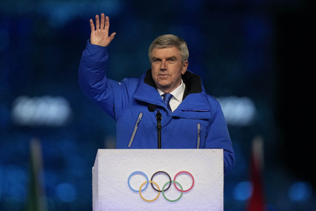 International Olympic Committee President Thomas Bach waves during the closing ceremony of the 2022 Winter Olympics, Sunday, Feb. 20, 2022, in Beijing