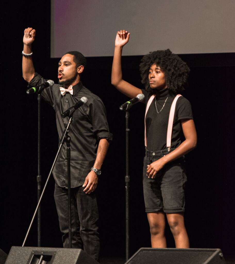 DEESOUL DeeSoul Carson (left), performs a group poem at the College Unions Poetry Slam Invitational (CUPSI). (Photo courtesy of DeeSoul Carson)