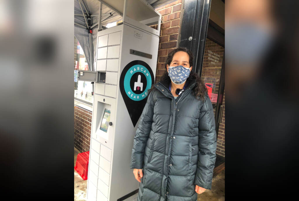 Image-from-iOS-(214) Health Commissioner Cheryl Bettigole with the Narcan vending machine. (Nina Feldman / WHYY)