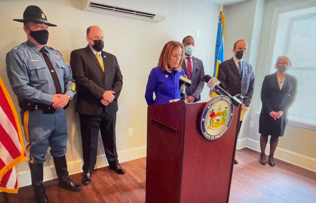 JENNINGS-ETc Attorney General Kathy Jennings (at microphone) says straw purchases are a prevalent menace. (State of Delaware)