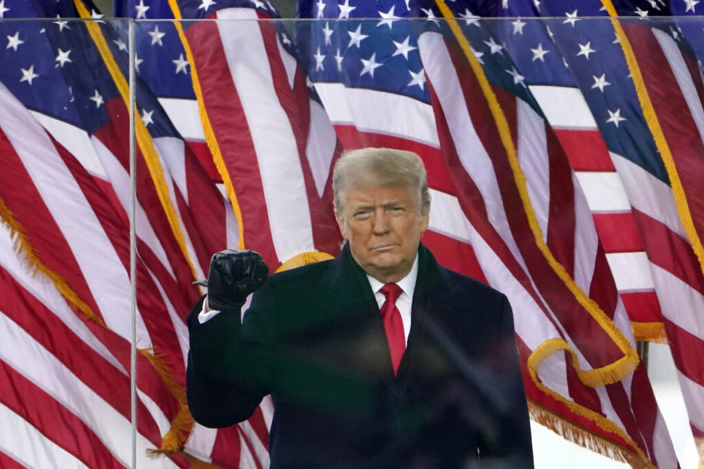 FILE - Then-President Donald Trump gestures as he arrives to speak at a rally in Washington, on Jan. 6, 2021. (AP Photo/Jacquelyn Martin, File)