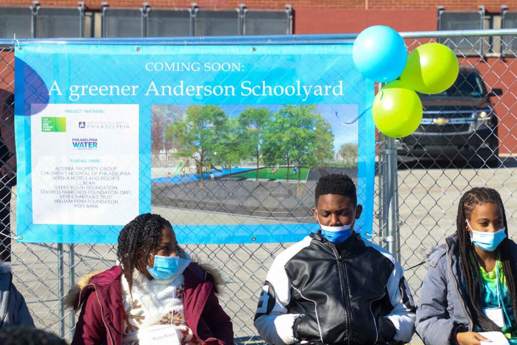 anderson-elementary-schoolyard-021522 People are seen wearing masks at a press event for a new schoolyard