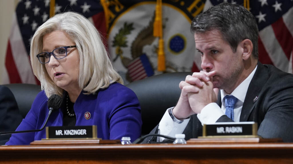 FILE - Rep. Liz Cheney, R-Wyo., and Rep. Adam Kinzinger, R-Ill., listen as the House select committee tasked with investigating the Jan. 6 attack on the U.S. Capitol meets on Capitol Hill in Washington, Oct. 19, 2021. Republican Party officials have voted to punish Cheney and Kinzinger and advanced a rule change that would prohibit candidates from participating in presidential debates organized by the Commission on Presidential Debates. GOP officials took a voice vote to approve both measures at the Republican National Committee’s winter meeting in Salt Lake City