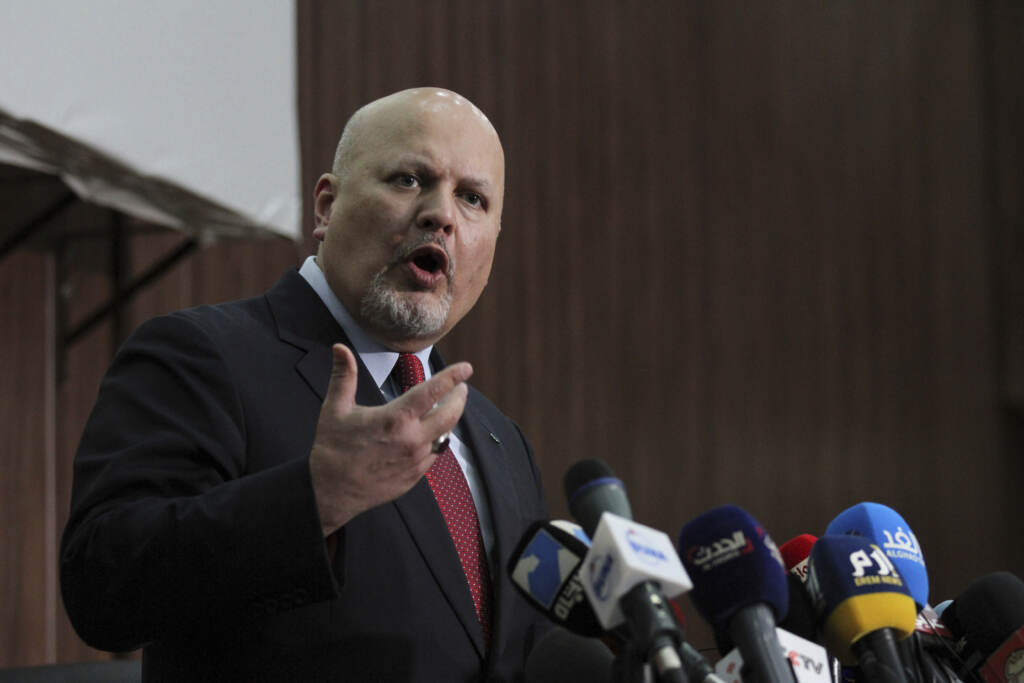 Karim Ahmed Khan, International Criminal Court chief prosecutor, speaks during a news conference at the Ministry of Justice in the Khartoum, Sudan, last August. The International Criminal Court’s prosecutor has put combatants and their commanders on notice that he is monitoring Russia’s invasion of Ukraine and has jurisdiction to prosecute war crimes and crimes against humanity. Karim Ahmed Khan, International Criminal Court chief prosecutor, speaks during a news conference at the Ministry of Justice in the Khartoum, Sudan, last August. The International Criminal Court's prosecutor has put combatants and their commanders on notice that he is monitoring Russia's invasion of Ukraine and has jurisdiction to prosecute war crimes and crimes against humanity. (Marwan Ali/AP)