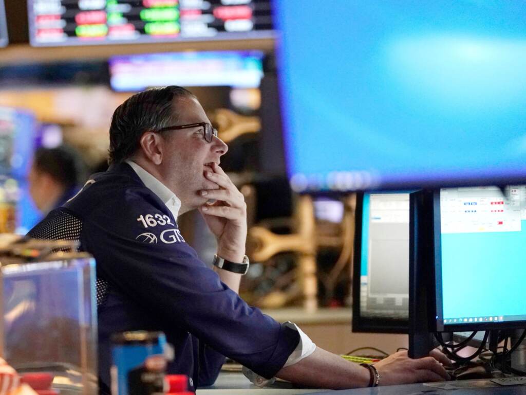 Traders work on the floor of the New York Stock Exchange at the opening bell on Tuesday in New York. Stocks tumbled on Thursday after Russia invaded Ukraine, sending the Nasdaq into what’s known as a bear market. Traders work on the floor of the New York Stock Exchange at the opening bell on Tuesday in New York. Stocks tumbled on Thursday after Russia invaded Ukraine, sending the Nasdaq into what's known as a bear market. (Photo by TIMOTHY A. CLARY / AFP) (Photo by TIMOTHY A. CLARY/AFP via Getty Images)