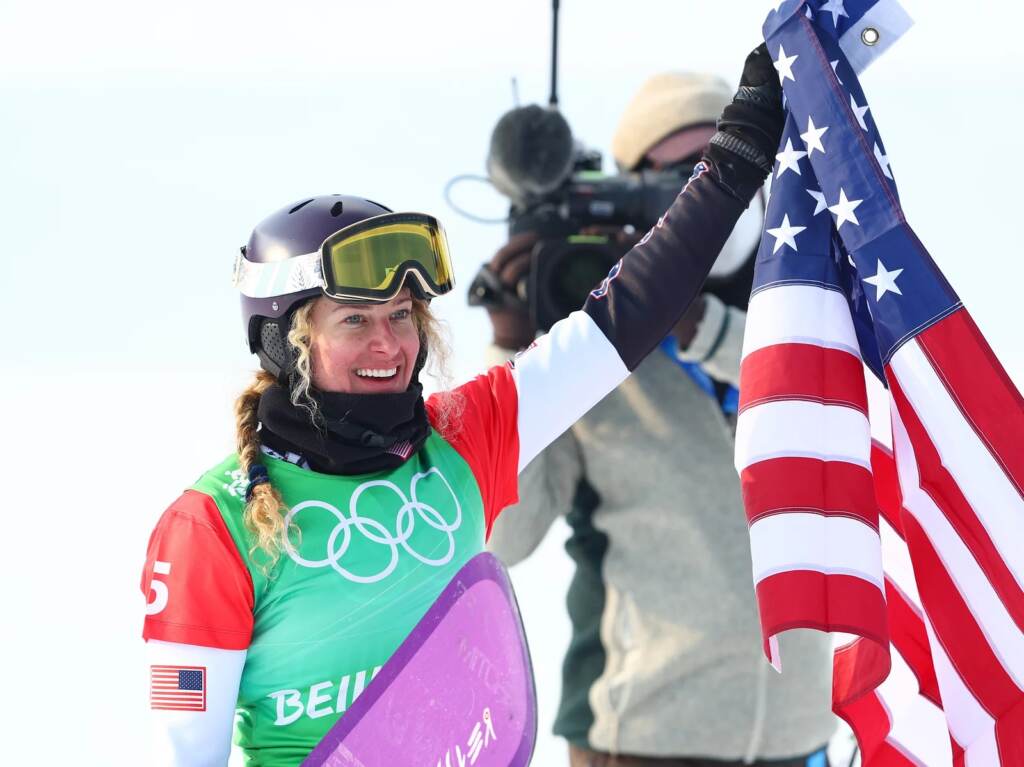 Lindsey Jacobellis wins gold at the women’s snowboard cross event at the Beijing Winter Olympics. This is the U.S.’s first gold medal of the Games. Gold medallist Lindsey Jacobellis of Team United States reacts after the Women's Snowboard Cross Big Final on Day 5 of the Beijing 2022 Winter Olympic Games at Genting Snow Park on February 09, 2022 in Zhangjiakou, China. (Photo by Clive Rose/Getty Images)