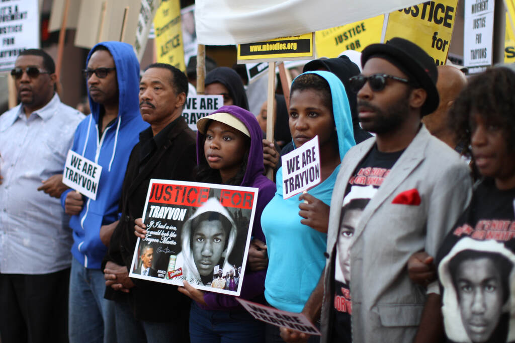 People in Los Angeles walk in a silent protest march on April 9, 2012, to demand justice for the killing of Trayvon Martin. People in Los Angeles walk in a silent protest march on April 9, 2012, to demand justice for the killing of Trayvon Martin. (David McNew/Getty Images)