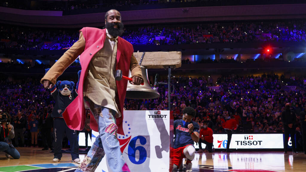 Philadelphia 76ers' James Harden reacts to ringing the bell before the team's NBA basketball game against the Boston Celtics, Tuesday, Feb. 15, 2022, in Philadelphia. (AP Photo/Chris Szagola)