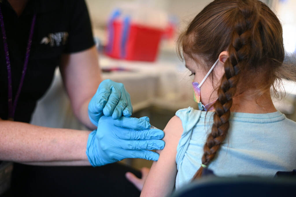 US-HEALTH-VIRUS-EPIDEMIC A nurse administers a pediatric dose of the COVID-19 vaccine