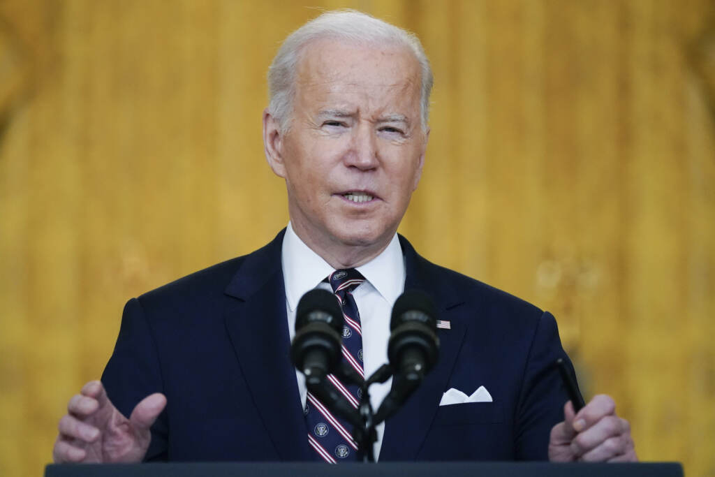 Joe Biden President Joe Biden speaks from a podium