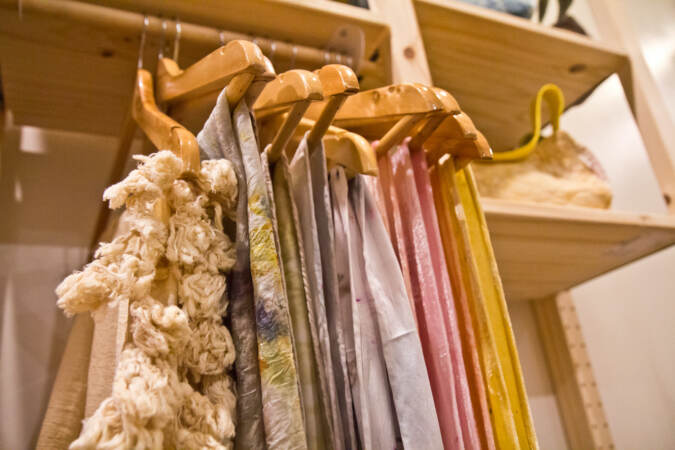Scarves are on display at Modest Transitions