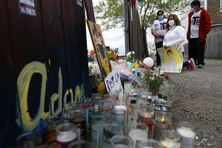 File photo: People pay tribute as they attend a peace walk honoring the life of police shooting victim 13-year-old Adam Toledo, Sunday, April 18, 2021, in Chicago's Little Village neighborhood. (AP Photo/Shafkat Anowar)