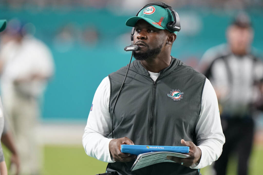 Brian Flores File photo: Miami Dolphins head coach Brian Flores stands on the sideline during the second half of an NFL football game against the New England Patriots, Sunday, Jan. 9, 2022, in Miami Gardens, Fla. (AP Photo/Wilfredo Lee)
