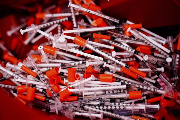 Shown are used syringes collected at a needle exchange run by Camden Area Health Education Center in Camden, N.J., Thursday, Feb. 24, 2022. (AP Photo/Matt Rourke)