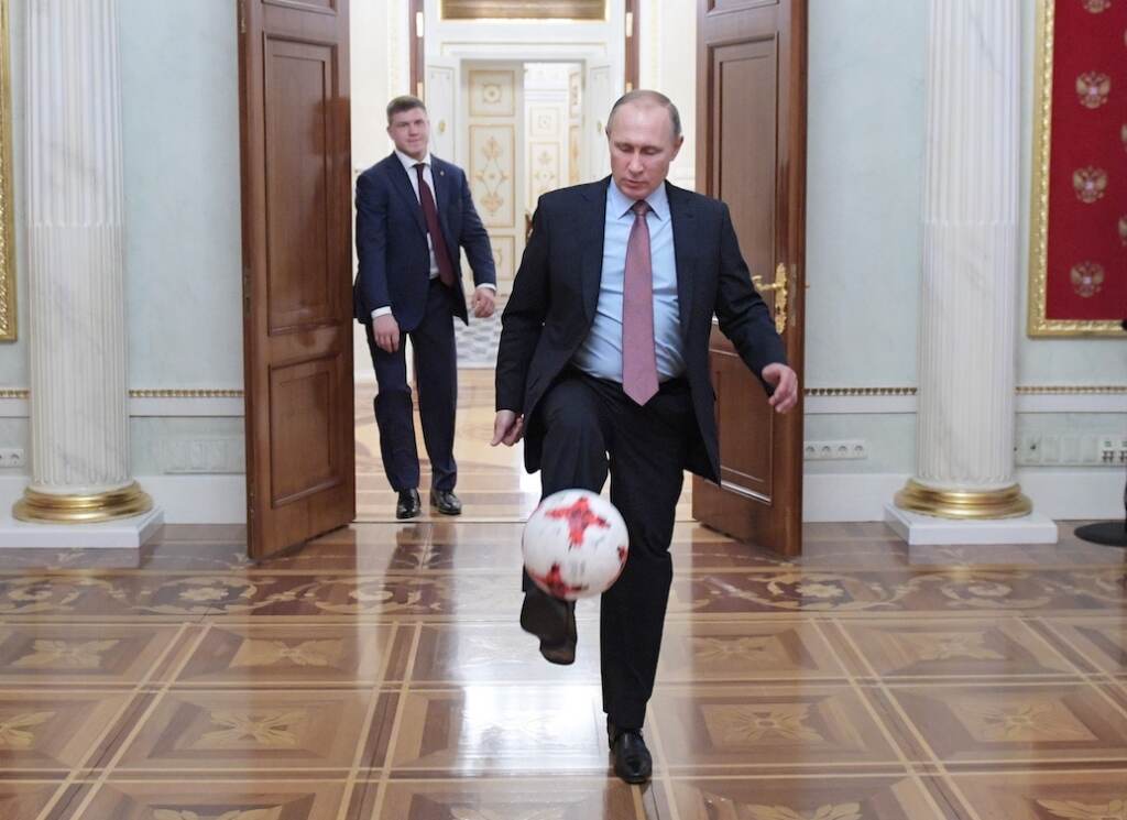 Ukraine Invasion Sports File photo: Russian President Vladimir Putin, foreground, plays with an official match ball for the 2017 FIFA Confederations Cup received from FIFA President Gianni Infantino, after their meeting in the Kremlin in Moscow, Russia, Friday, Nov. 25, 2016. (Alexei Druzhinin, Sputnik, Kremlin Pool Photo via AP, File)