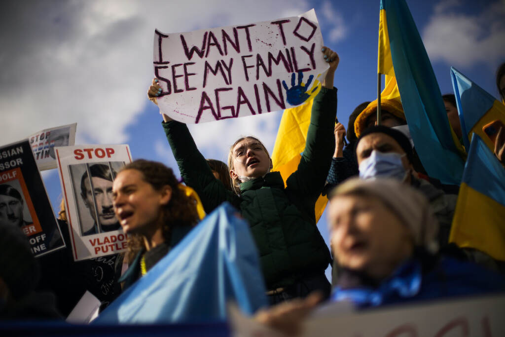 APTOPIX Turkey Russia Ukraine War Pro-Ukrainian people hold up placards and wave Ukrainian flags as they shout slogans during a protest against Russia's invasion of Ukraine, in Istanbul, Turkey, Wednesday, March 2, 2022. (AP Photo/Francisco Seco)