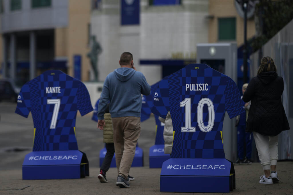 Britain Russia Ukraine War Sports Tourists visit Stamford Bridge stadium home of Chelsea football club in London, Thursday, March 3, 2022. (AP Photo/Alastair Grant)