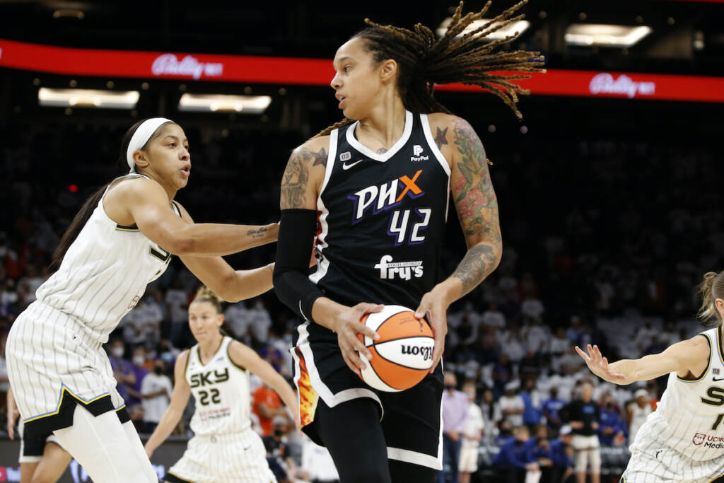 Russia-Griner Arrested Basketball File photo: Phoenix Mercury center Brittney Griner (42) looks to pass as Chicago Sky center Candace Parker defends during the first half of game 1 of the WNBA basketball Finals , Sunday, Oct. 10, 2021, in Phoenix.(AP Photo/Ralph Freso)