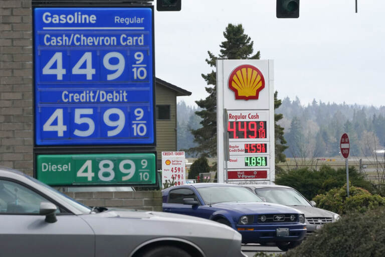 Gas prices are shown Monday, March 7, 2022, in Tumwater, Wash. (AP Photo/Ted S. Warren)