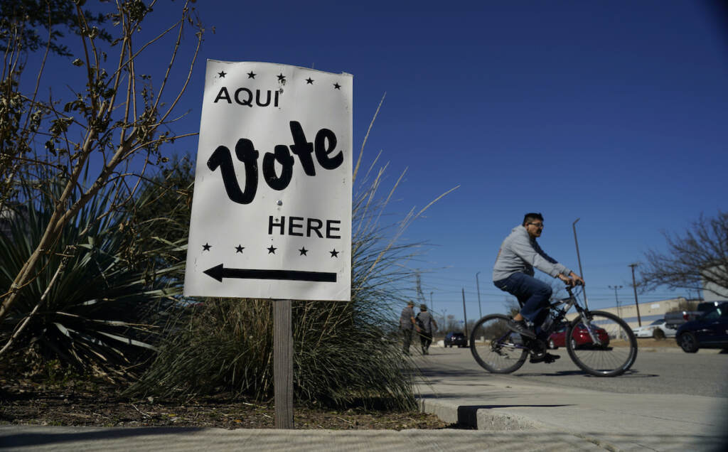 Election 2020 Texas Ballots Voters leave an early voting poll site, Feb. 14, 2022, in San Antonio. (AP Photo/Eric Gay)