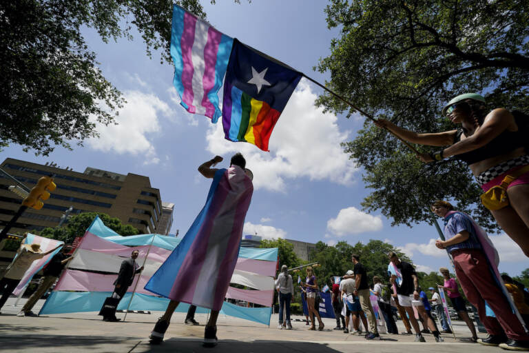File photo: Demonstrators gather on the steps to the State Capitol to speak against transgender-related legislation bills being considered in the Texas Senate and Texas House, Thursday, May 20, 2021 in Austin, Texas. A Texas judge on Friday, March 11, 2022 blocked the state from investigating as child abuse gender confirming care for transgender youth. District Judge Amy Clark Meachum issued a temporary injunction preventing the state from enforcing Republican Gov. Greg Abbott’s directive to compel the Department of Family and Protective Services to investigate.